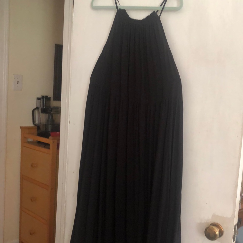Old Navy halter look sundress with elastic at front and back. Very flowy.